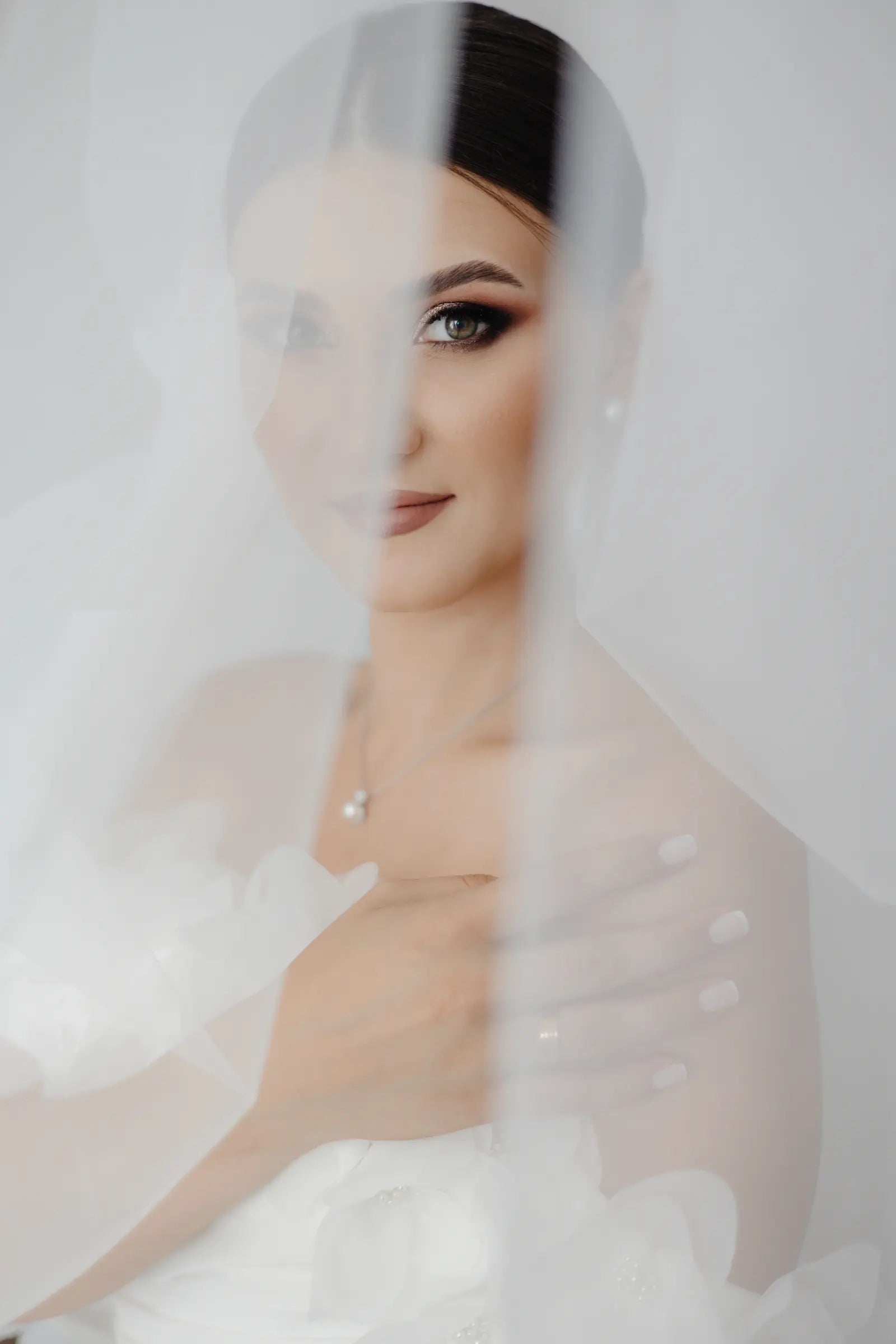 files/woman-with-necklace-white-background.webp